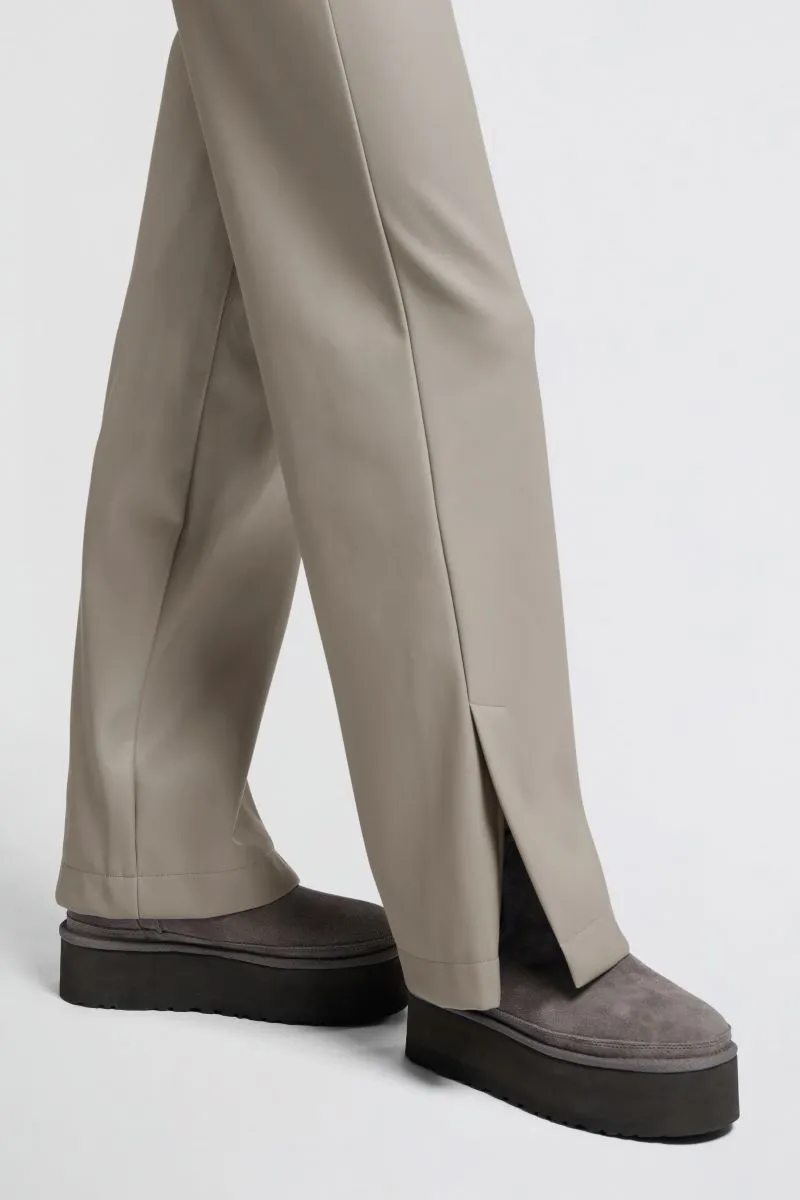 Faux leather trousers with wide legs